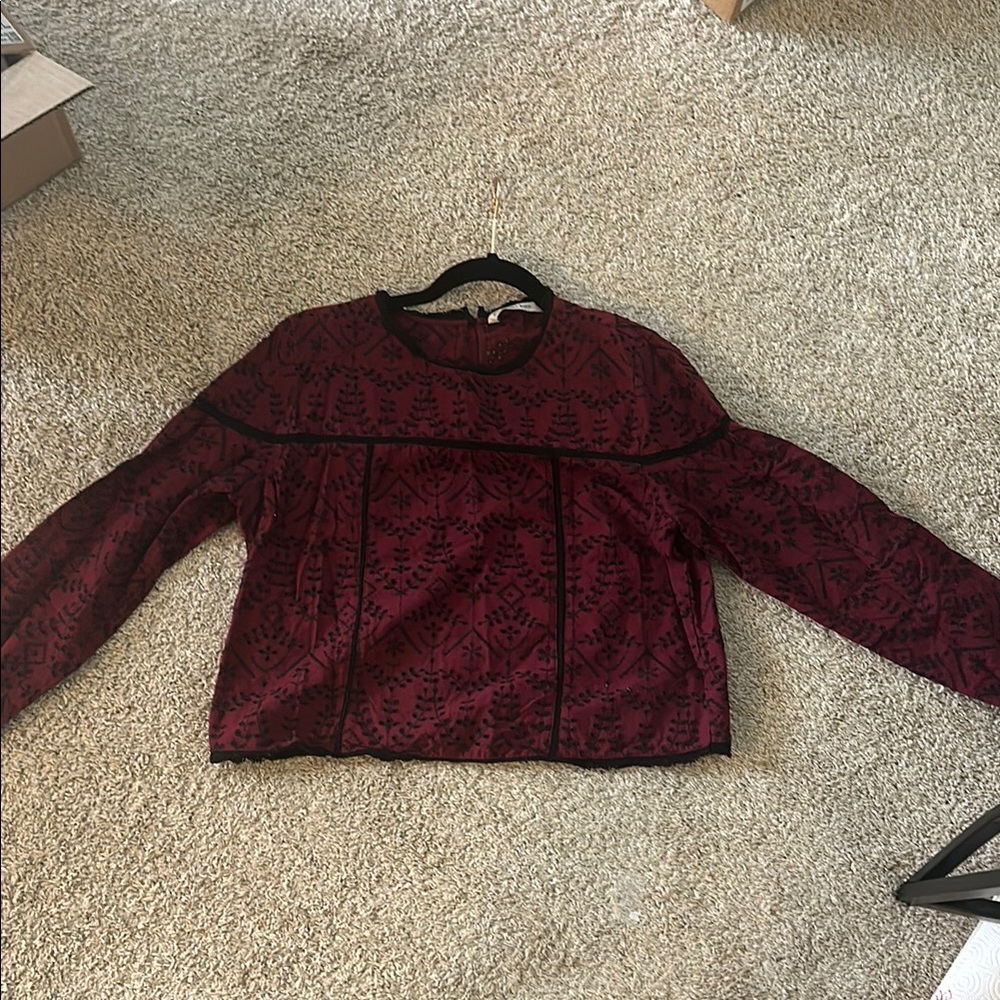 Maroon and black long sleeve top